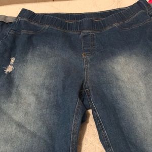 L semi-distressed blue jeans